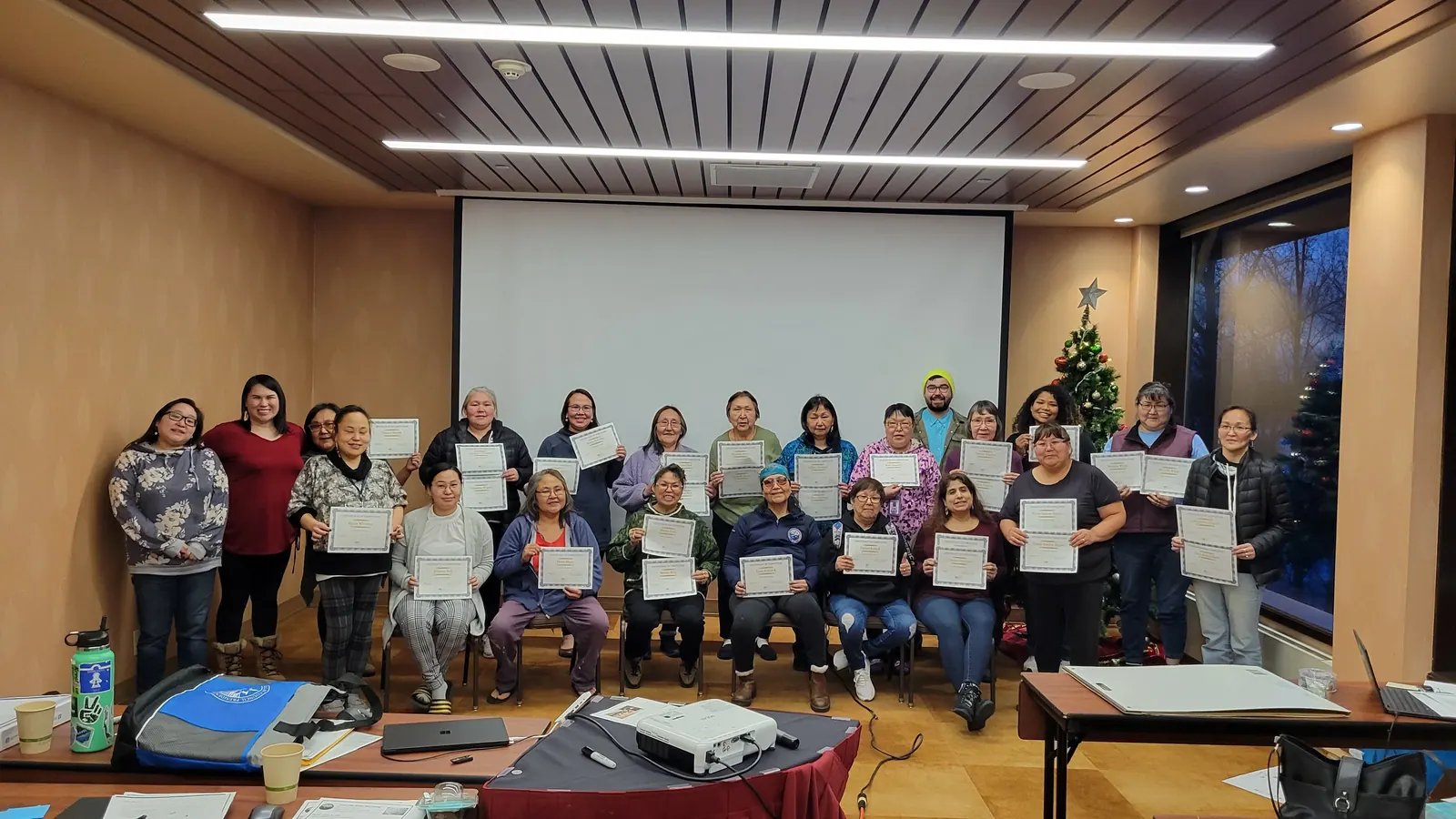 Training participants holding certificates
